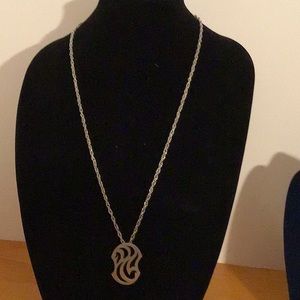 Vintage Kelly waters pewter pendant with chain.